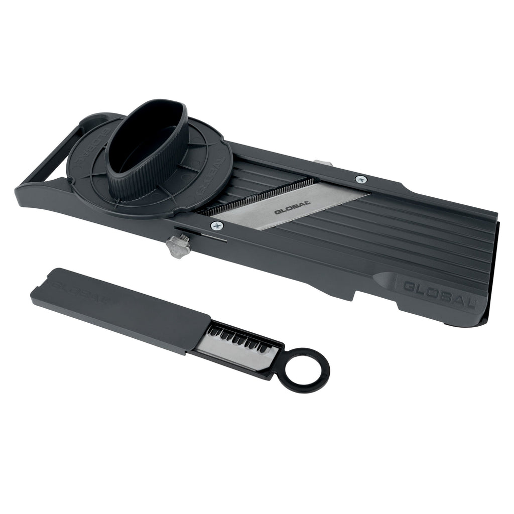 Black vegetable slicer with detachable blades for slicing, julienning and shredding fruit and vegetables with protective case on a white background