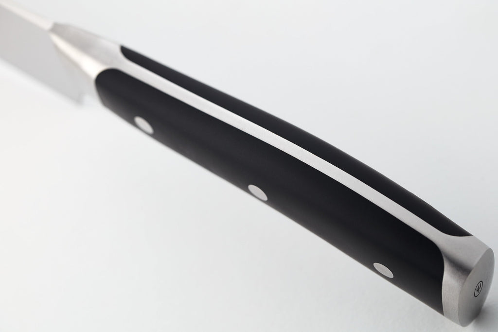 Classic Ikon Asian Utility Knife 12 cm | 4 1/2 inch with a sleek forged blade, full tang black handle, and three polished rivets for balance and durability