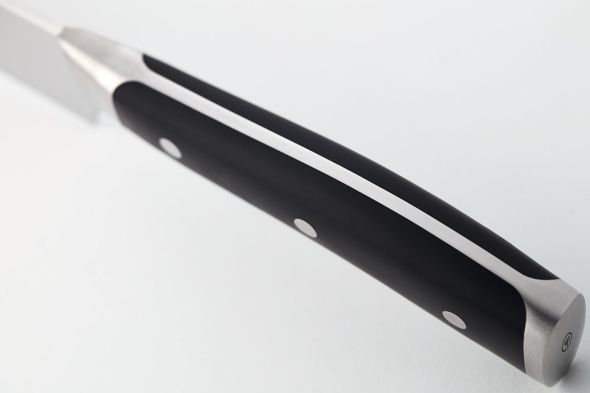 Classic Ikon Asian Utility Knife 12 cm | 4 1/2 inch with a sleek forged blade, full tang black handle, and three polished rivets for balance and durability